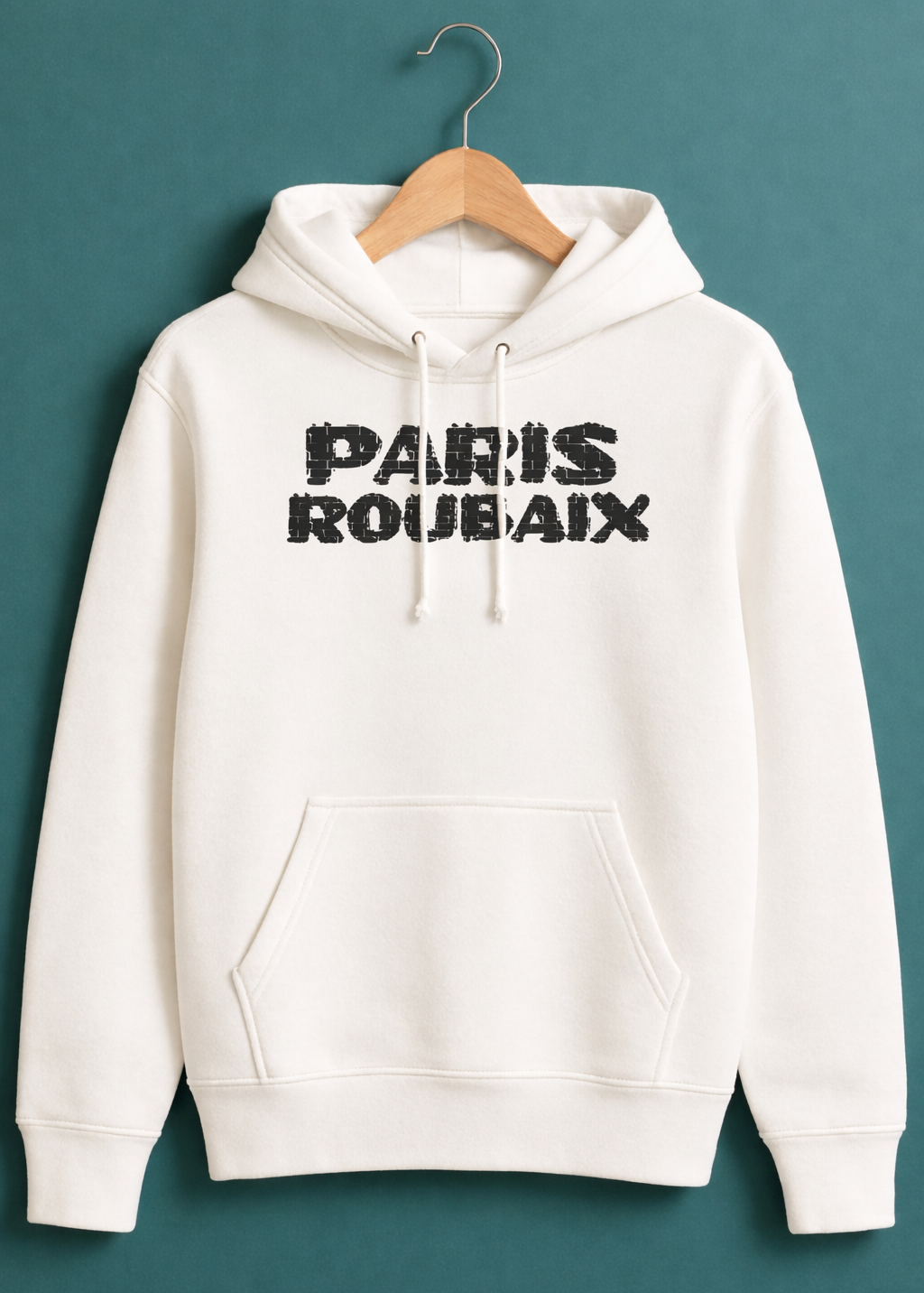 White hoodie with 'PARIS ROUBAIX' text on a hanger against a teal background