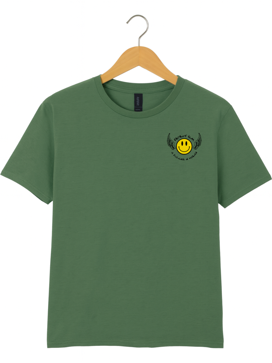 A green short-sleeve crewneck t-shirt hanging on a wooden hanger against a white background, featuring a yellow smiley face graphic with black wings on the left chest.
