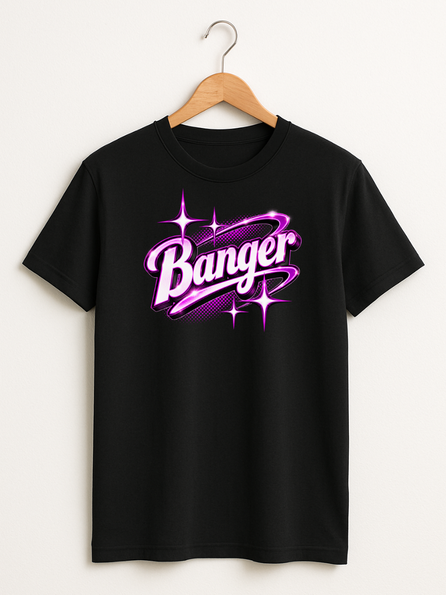 A black short-sleeve t-shirt hanging on a wooden hanger against a light beige wall. The shirt features a prominent graphic on the chest with the word 'Banger' in stylized purple and pink bubble lettering, accented with pink starbursts.