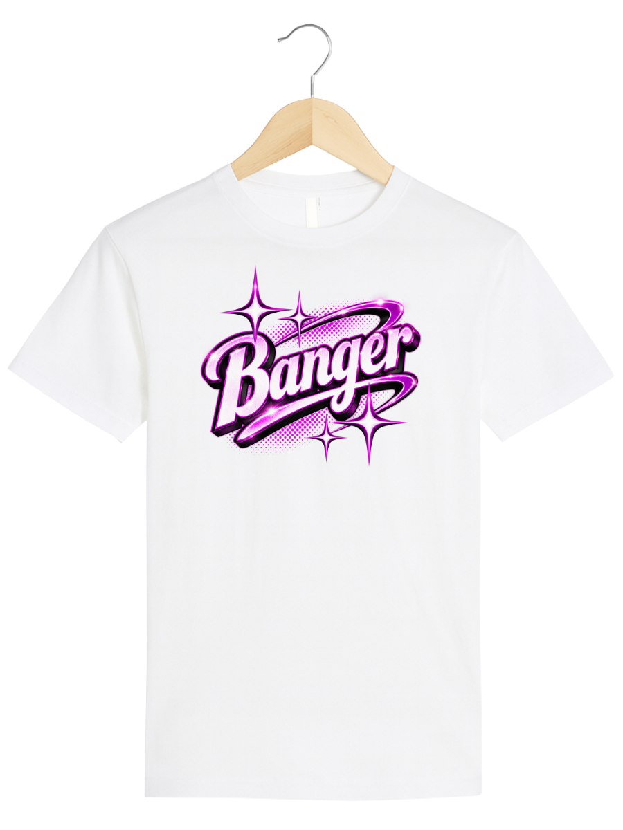 A white short-sleeve crewneck t-shirt hanging on a light wood hanger against a white background. The shirt features a prominent graphic on the chest with the word 'Banger' in stylized purple and pink bubble lettering with starburst accents.