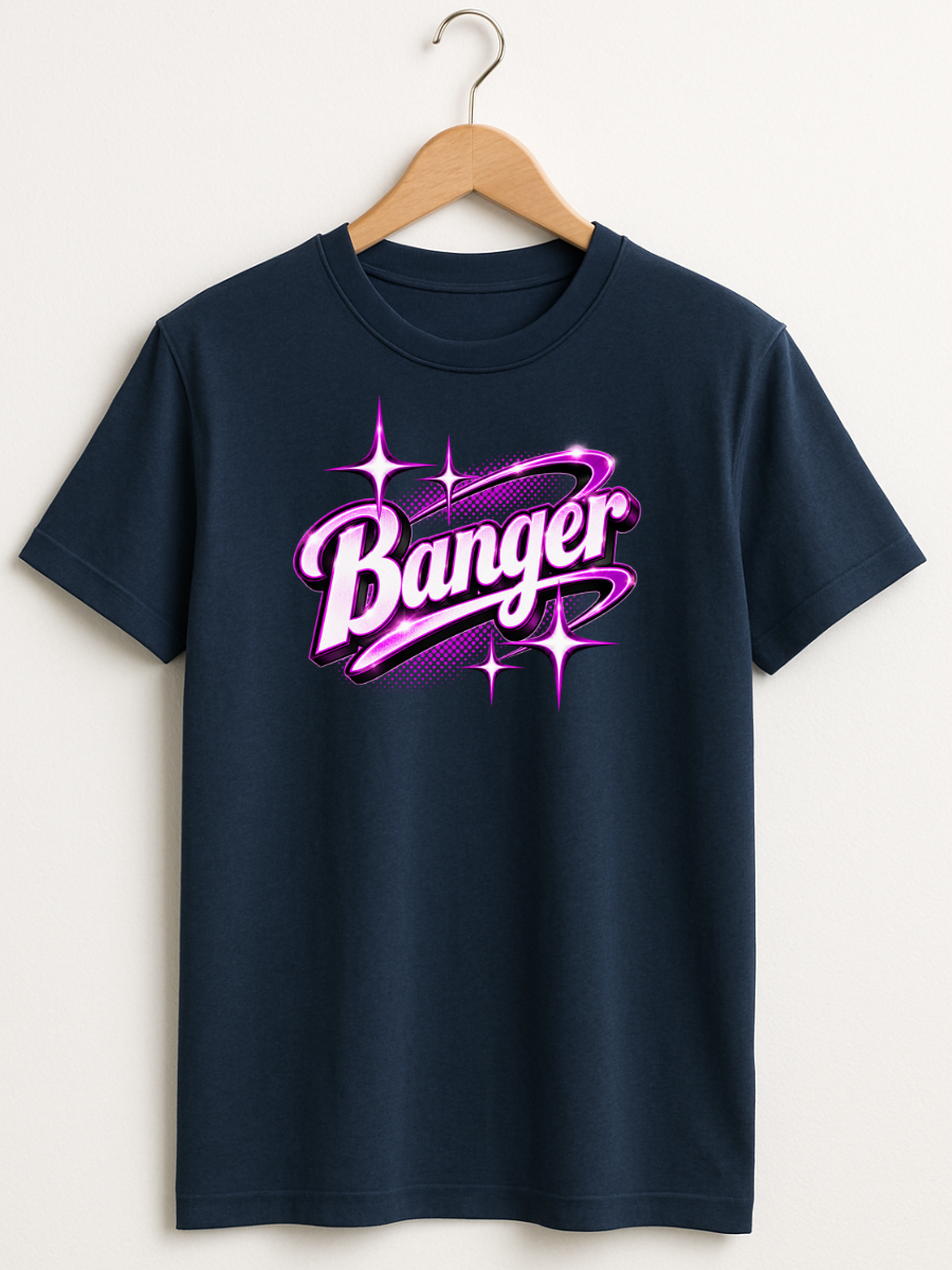 A navy blue short-sleeve t-shirt hanging on a wooden hanger against a light beige wall. The shirt features a prominent graphic on the chest with the word 'Banger' in stylized purple and pink lettering with starburst accents.