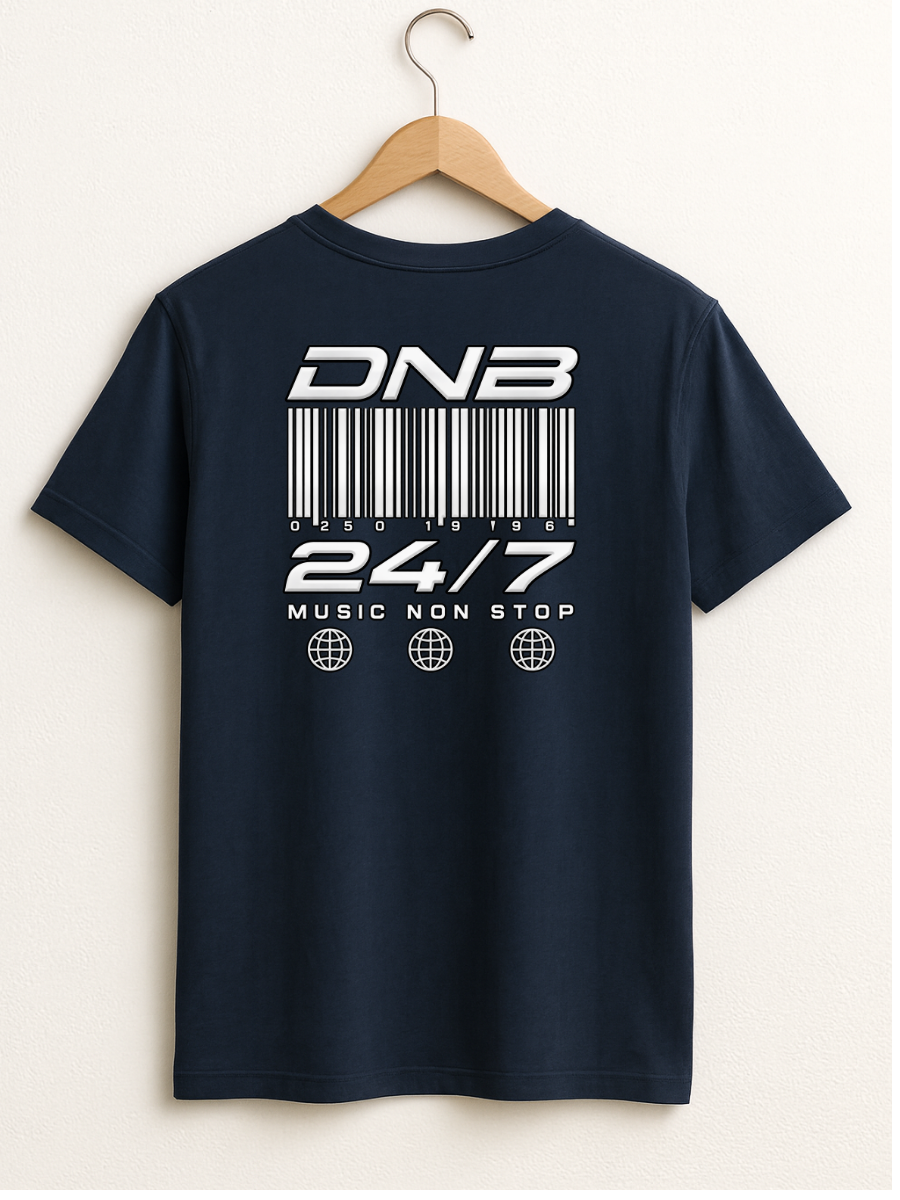 A navy t-shirt hanging on a wooden hanger against a white background, featuring a white graphic print on the back with the text 'DNB', a barcode, '24/7', 'MUSIC NON STOP', and three globe icons.