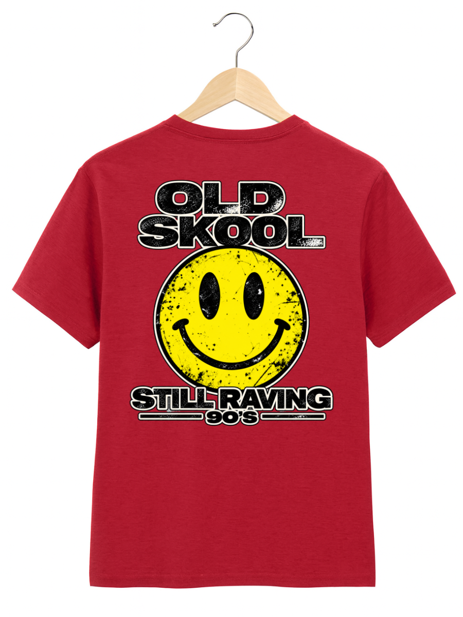 A red short-sleeve t-shirt on a wooden hanger, featuring a distressed yellow smiley face graphic with the text 'OLD SKool STILL RAVING 90's'.
