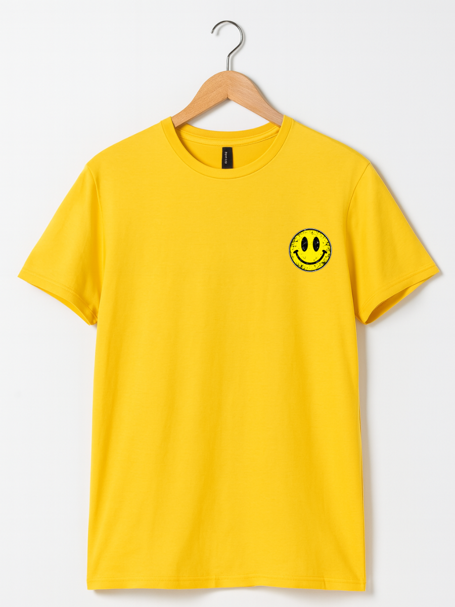 A bright yellow short-sleeve t-shirt hanging on a wooden hanger against a light gray background. The shirt features a small yellow smiley face graphic printed on the left chest.