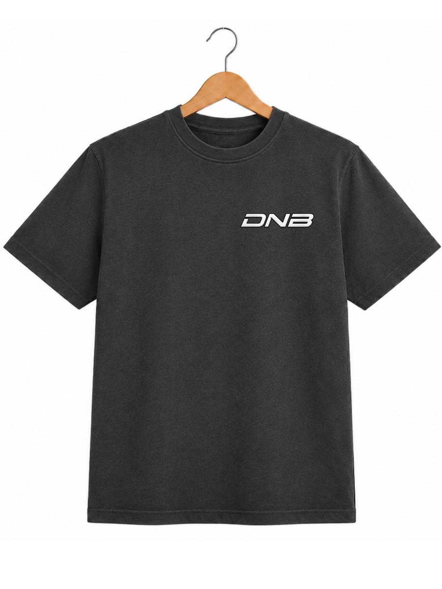 A dark charcoal grey crewneck t-shirt hanging on a wooden hanger against a plain white background. The shirt features a white 'DNB' logo printed on the left chest.