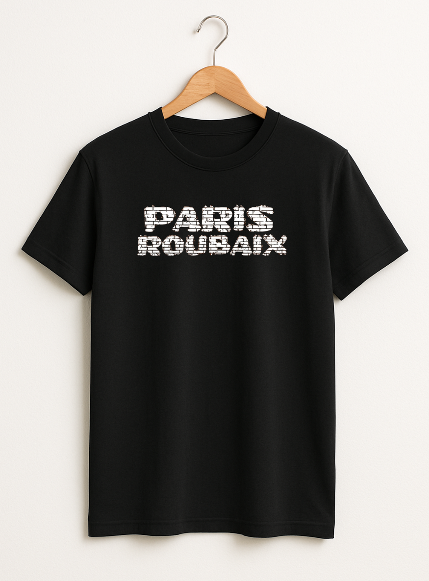 Black t-shirt with 'PARIS ROUBAIX' text on a hanger against a white background