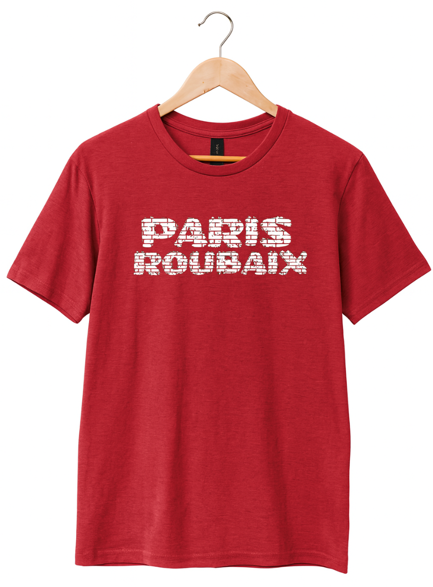 Red t-shirt with 'PARIS ROUBAIX' text on a hanger against a white background