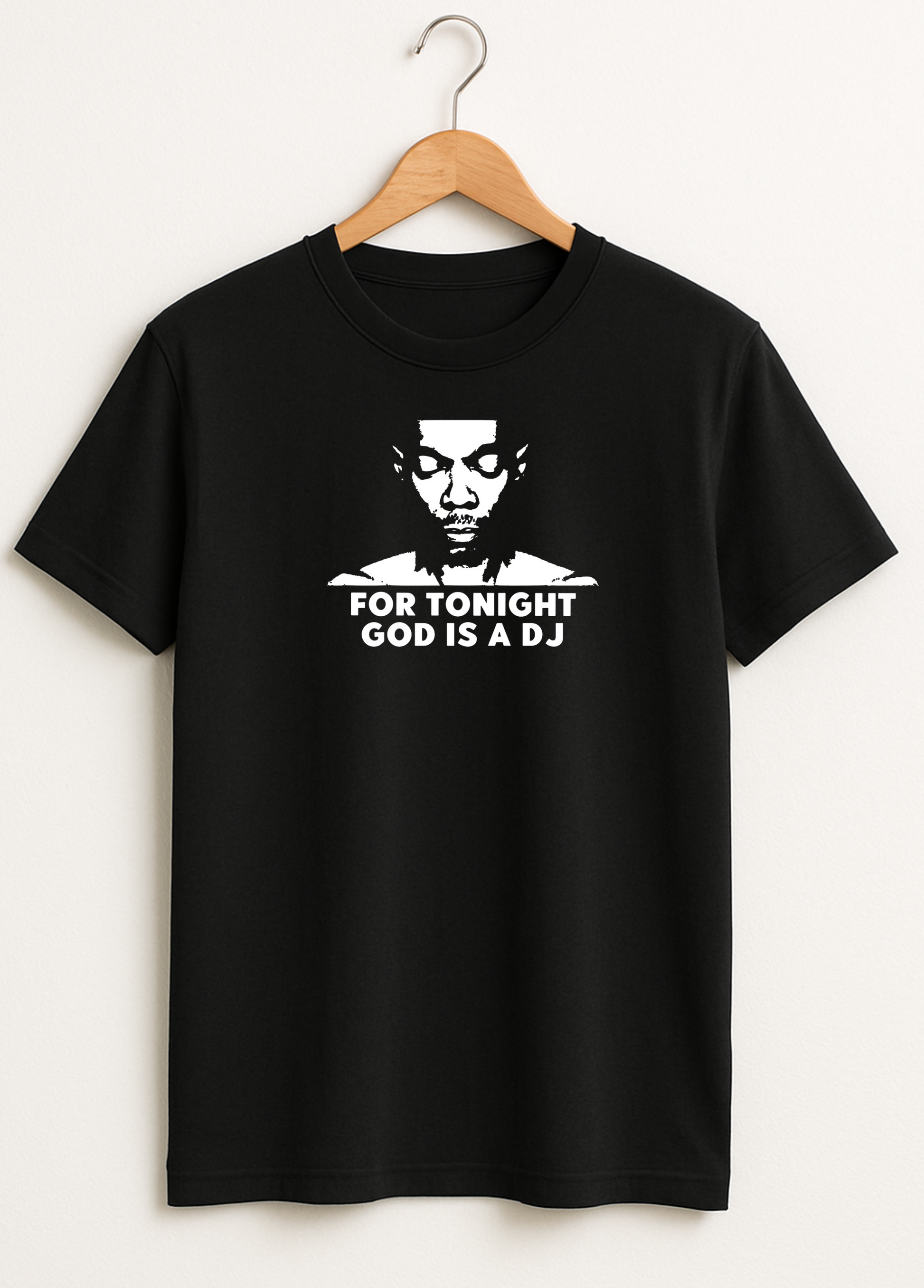 Black t-shirt with white graphic and text on a hanger against a white background