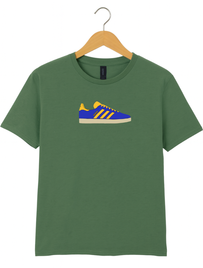 Green t-shirt with a blue and yellow sneaker graphic on a hanger against a white background