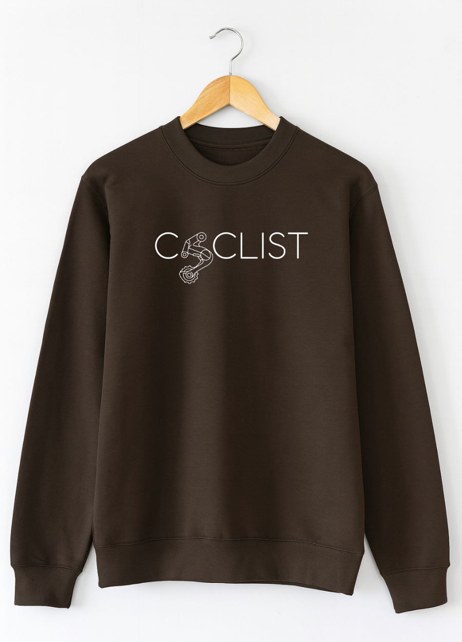 Brown sweatshirt with 'CYCLIST' text on a hanger against a white background