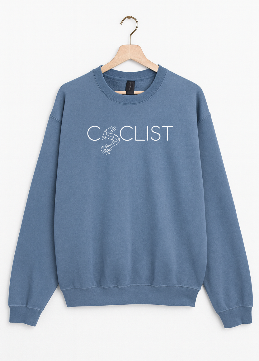 Blue sweatshirt with 'Cyclist' text on a hanger against a white background