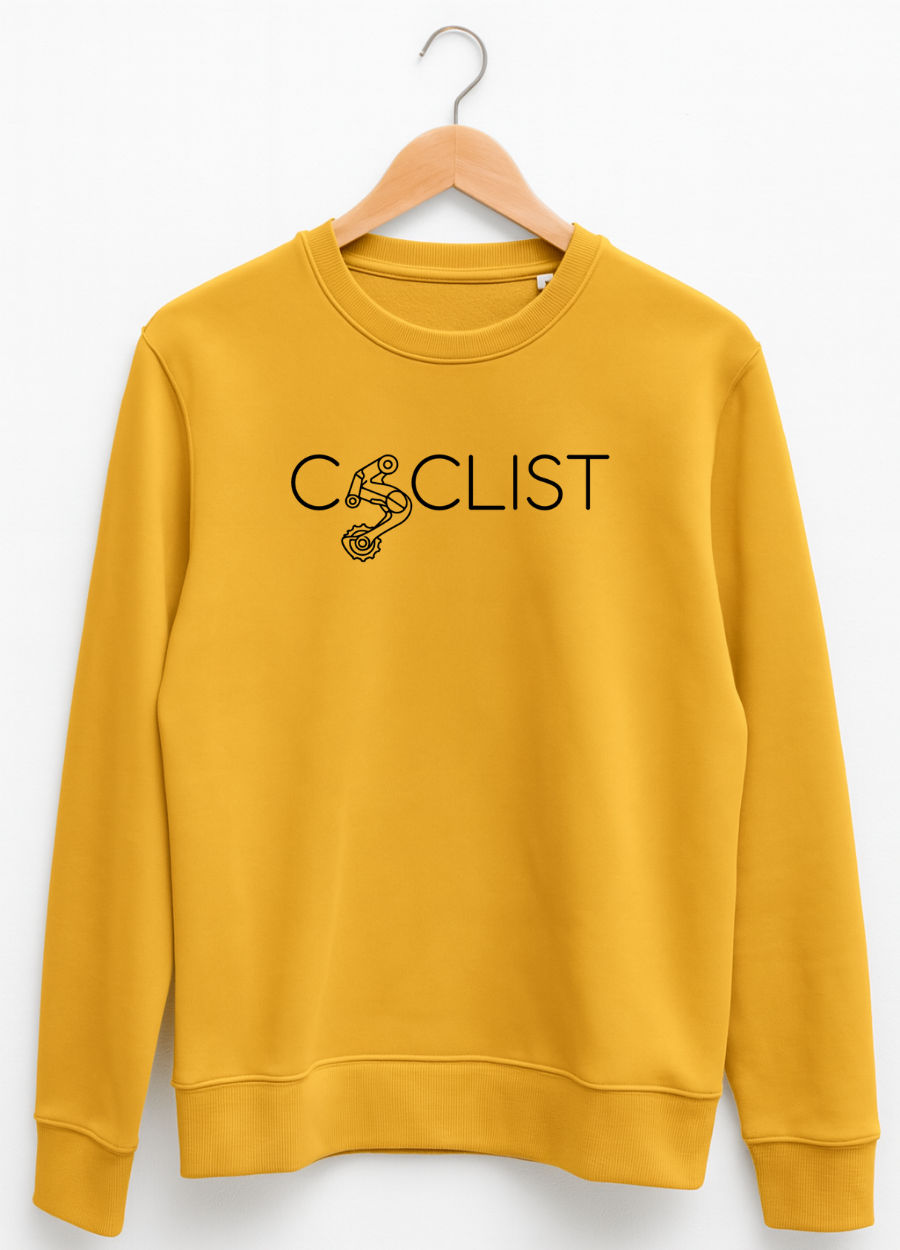 Yellow sweatshirt with 'CYCLIST' text and graphic on a hanger against a white background