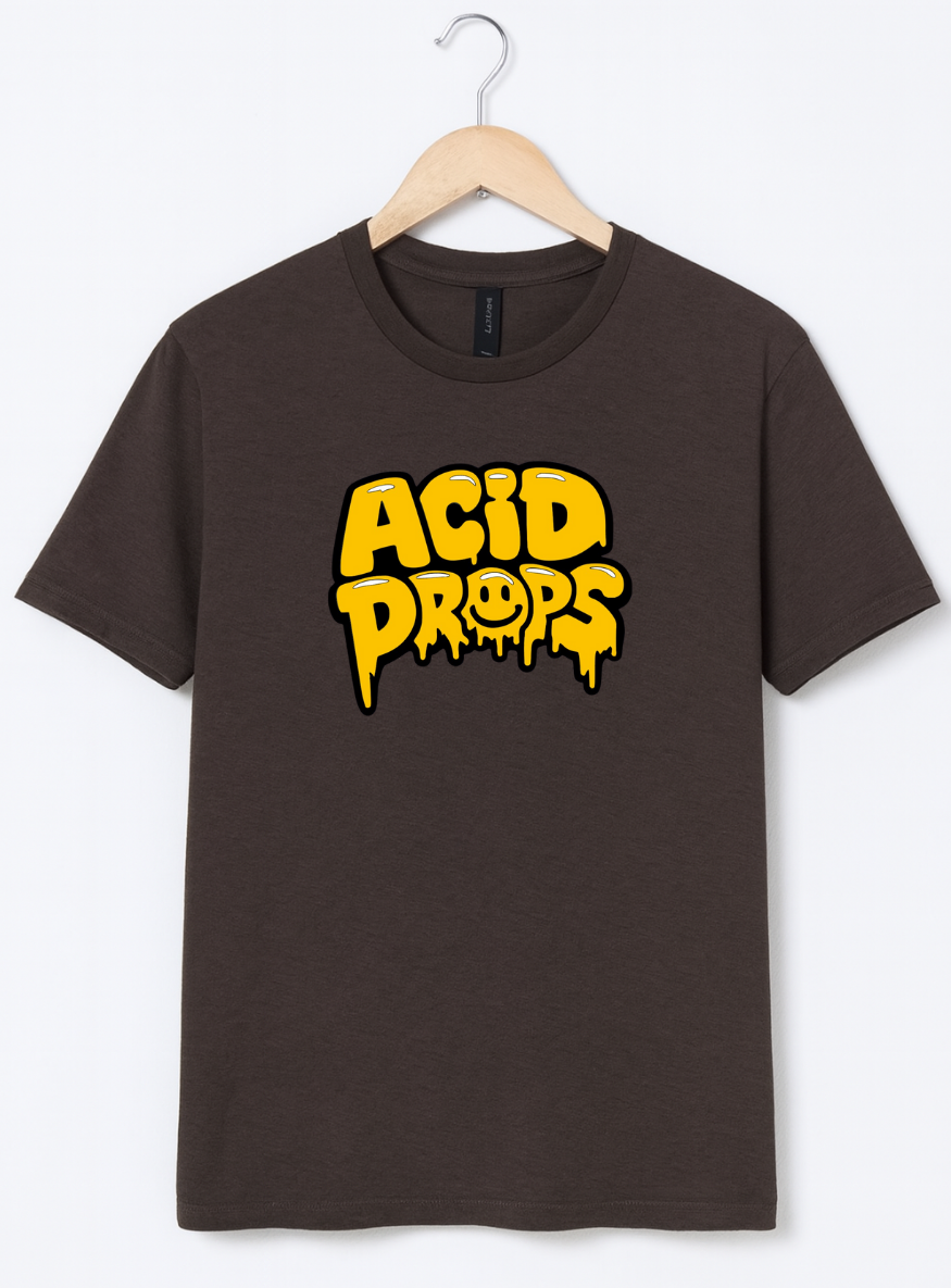 Brown t-shirt with yellow 'ACID DROPS' text on a hanger against a white background