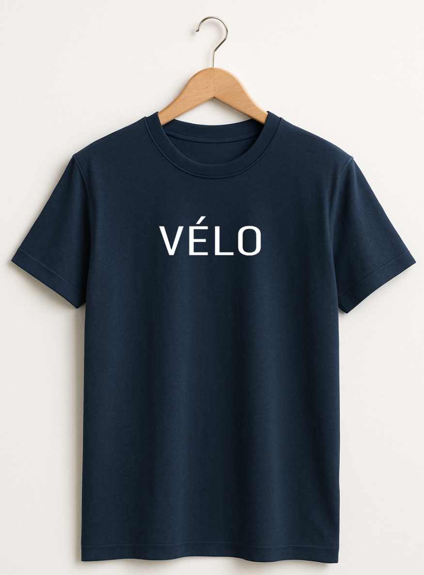 Navy blue t-shirt with 'VELO' printed on it, hanging on a wooden hanger against a white background.