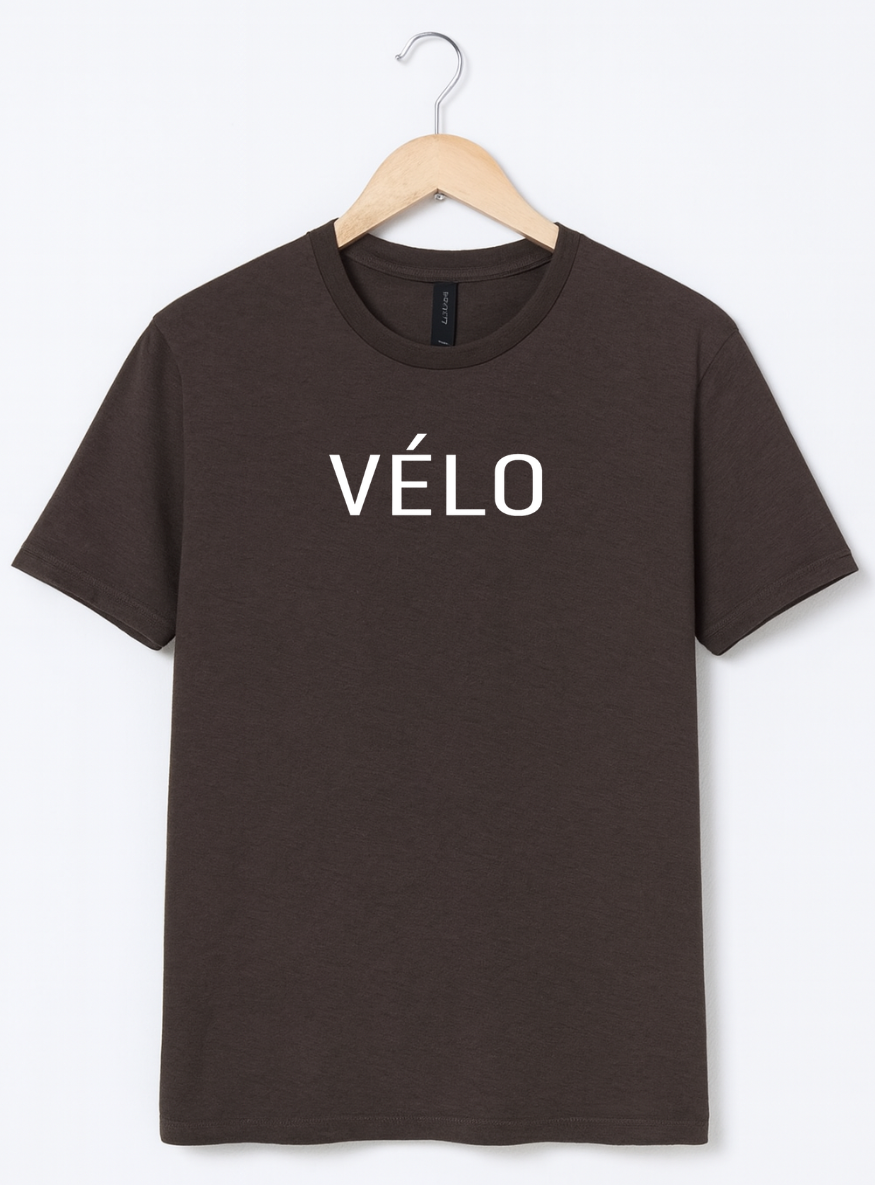 Brown t-shirt with 'VELO' printed on it hanging on a wooden hanger against a white background