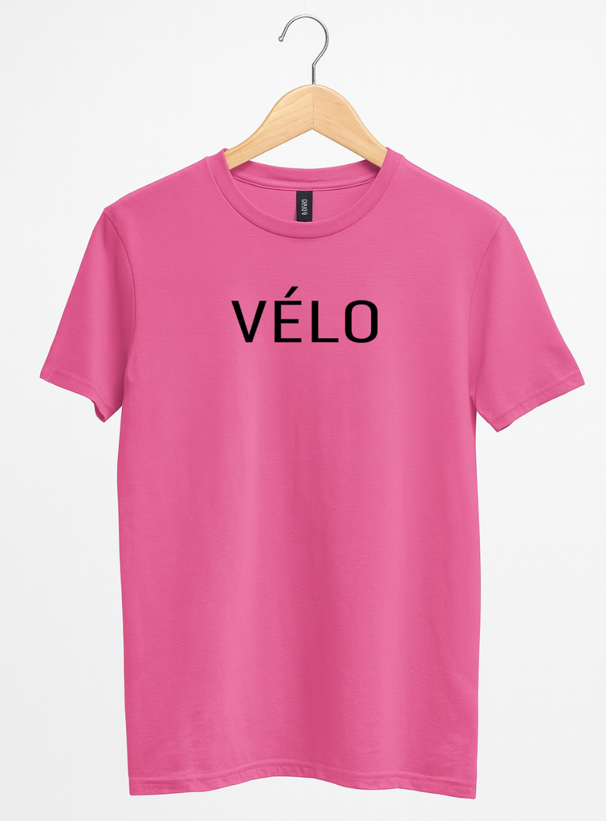 Pink t-shirt with 'VELO' text on a hanger against a white background