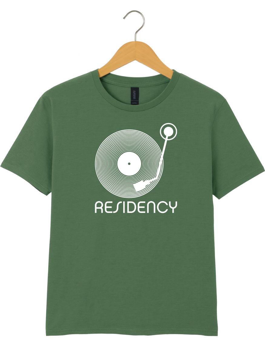 Green t-shirt with a record player graphic and 'RESIDENCY' text on a hanger against a white background