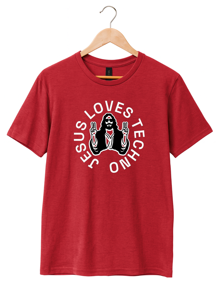 Red  t-shirt on a wooden hanger featuring a white “Jesus Loves Techno” graphic with a stylized illustration of Jesus wearing sunglasses and making peace signs.