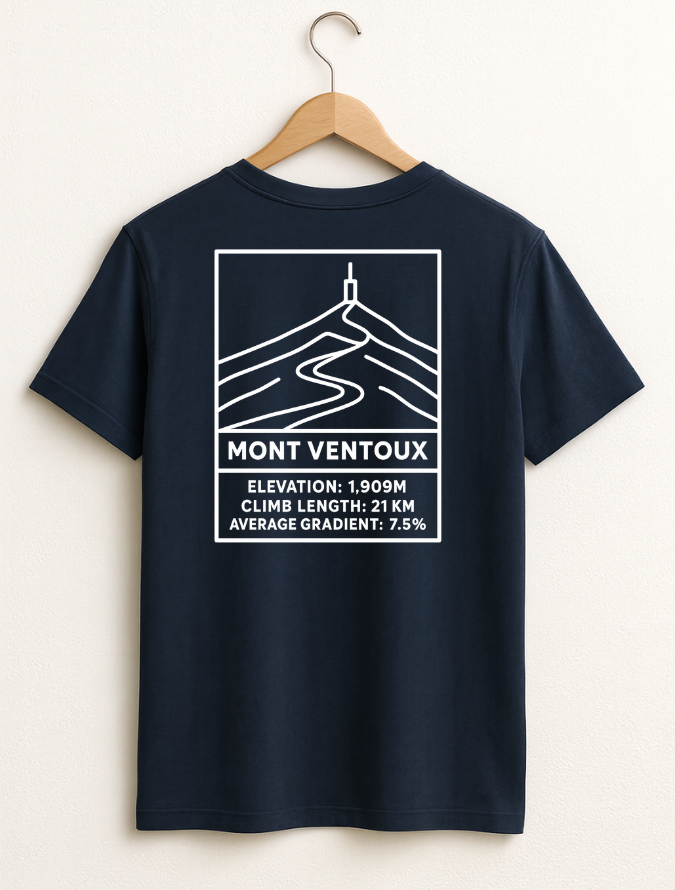 Navy blue T-shirt hanging on a wooden hanger with a white line-art Mont Ventoux graphic and elevation details printed on the back.