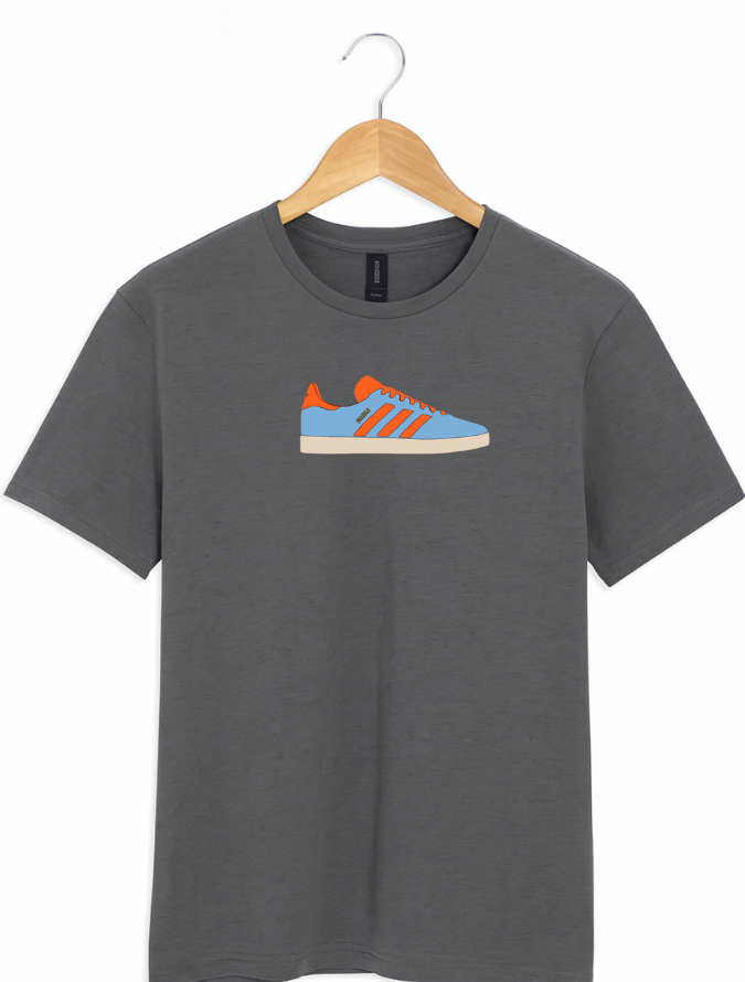 Grey t-shirt with a shoe graphic on a wooden hanger against a white background