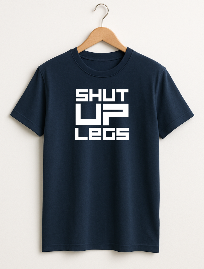 Navy blue t-shirt with 'SHUT UP LEGS' text on a hanger against a white background