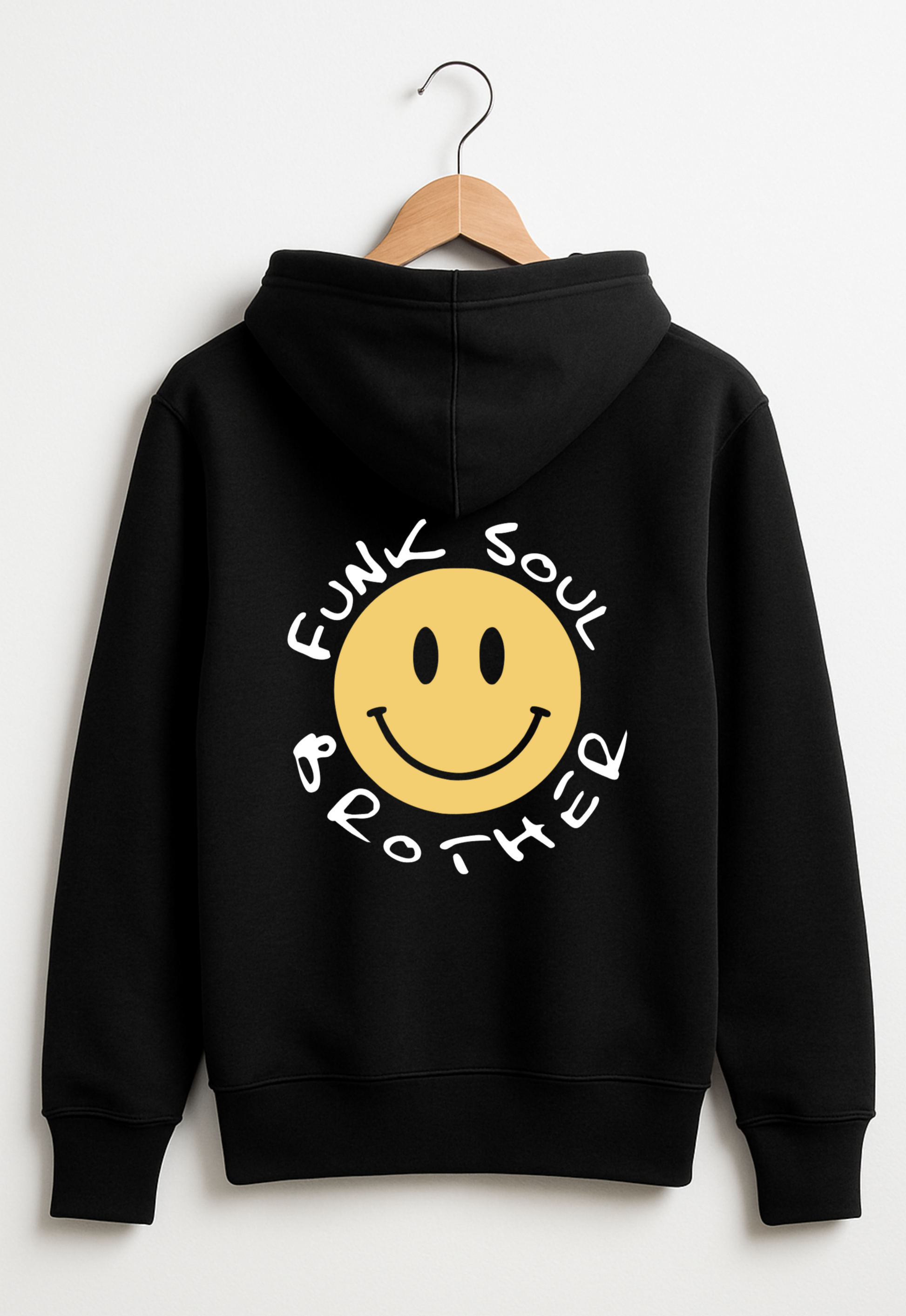Black hoodie with a smiley face and text on the back, hanging on a wooden hanger against a white background.