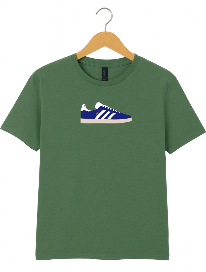 Green t-shirt with a blue and white shoe graphic on a hanger against a white background
