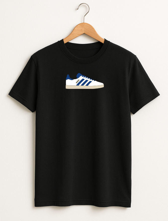 Black t-shirt with a shoe graphic on a hanger against a white background