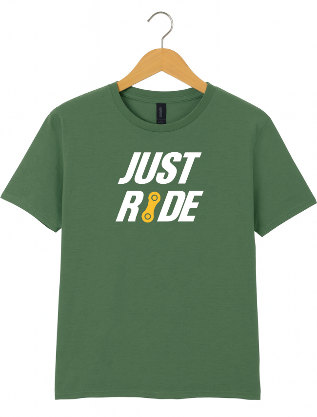 Green t-shirt with 'JUST RIDE' text on a hanger against a white background