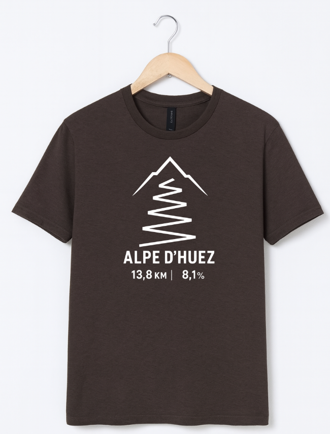 Brown t-shirt with white mountain graphic and text on a hanger against a white background