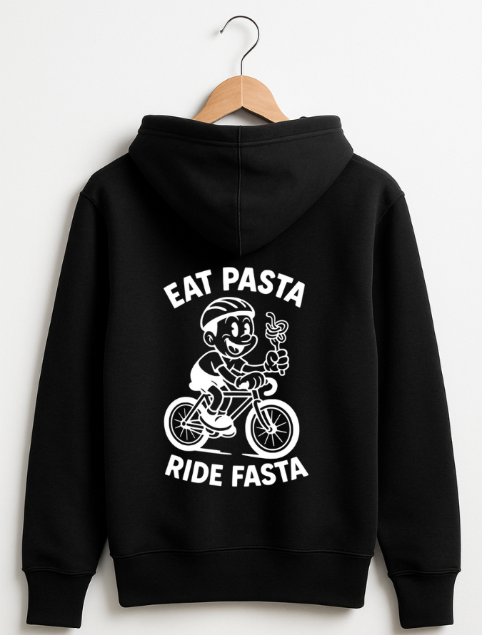 Black hoodie with white graphic and text 'Eat Pasta Ride Fasta' on a hanger against a white background