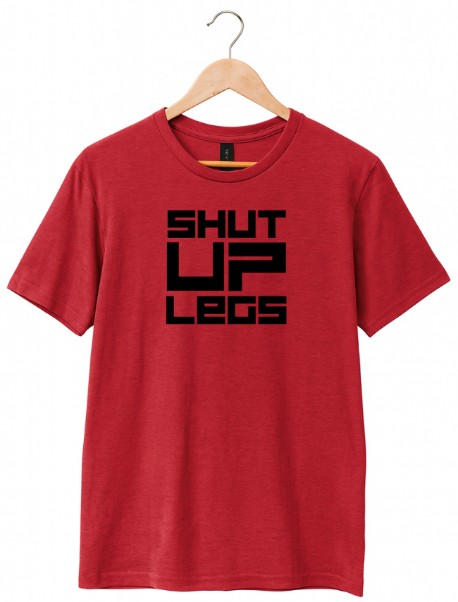 Red t-shirt with 'SHUT UP LEGS' text on a hanger against a white background