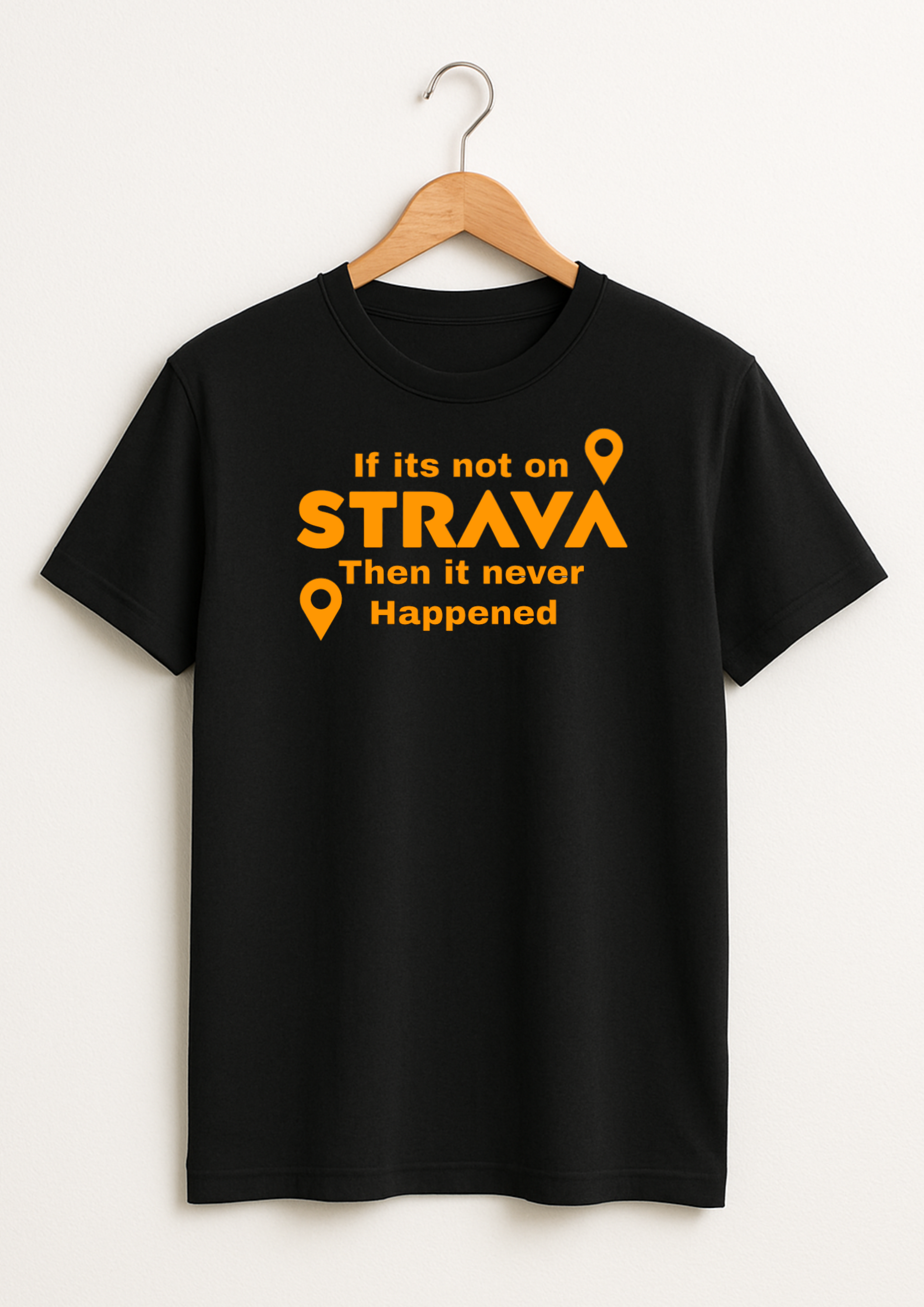 Black t-shirt with orange strava
 text and graphics on a hanger against a white background