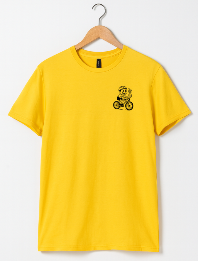 Yellow t-shirt with a small black graphic on a hanger against a white background
