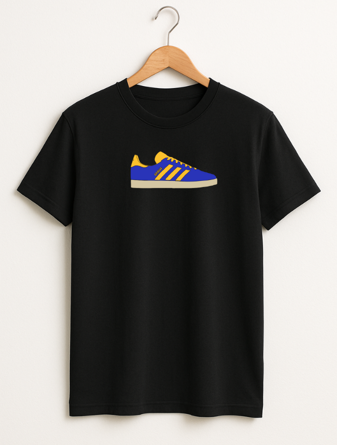 Black t-shirt with a blue and yellow shoe graphic on a hanger against a white background