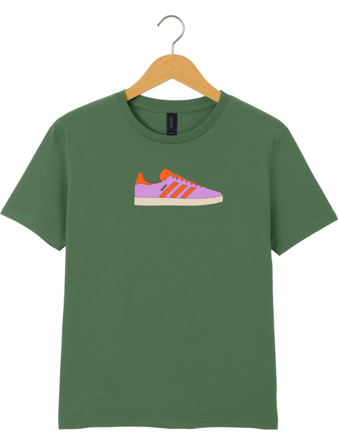 Green t-shirt with a shoe graphic on a hanger against a white background