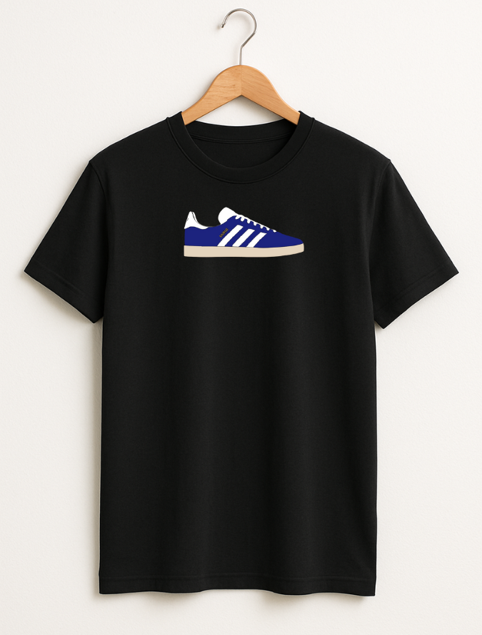 Black t-shirt with blue and white shoe graphic on a hanger against a white background