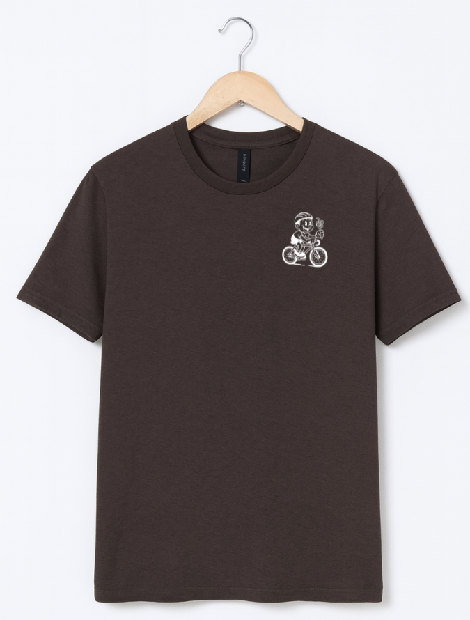 Brown t-shirt with a small graphic on a hanger against a white background