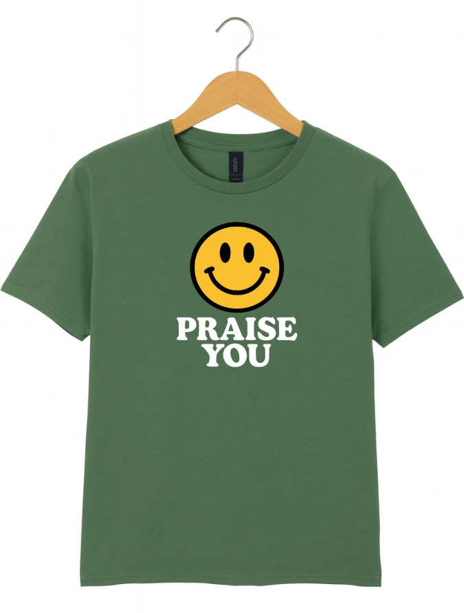 Green t-shirt with a yellow smiley face and 'PRAISE YOU' text on a hanger against a white background