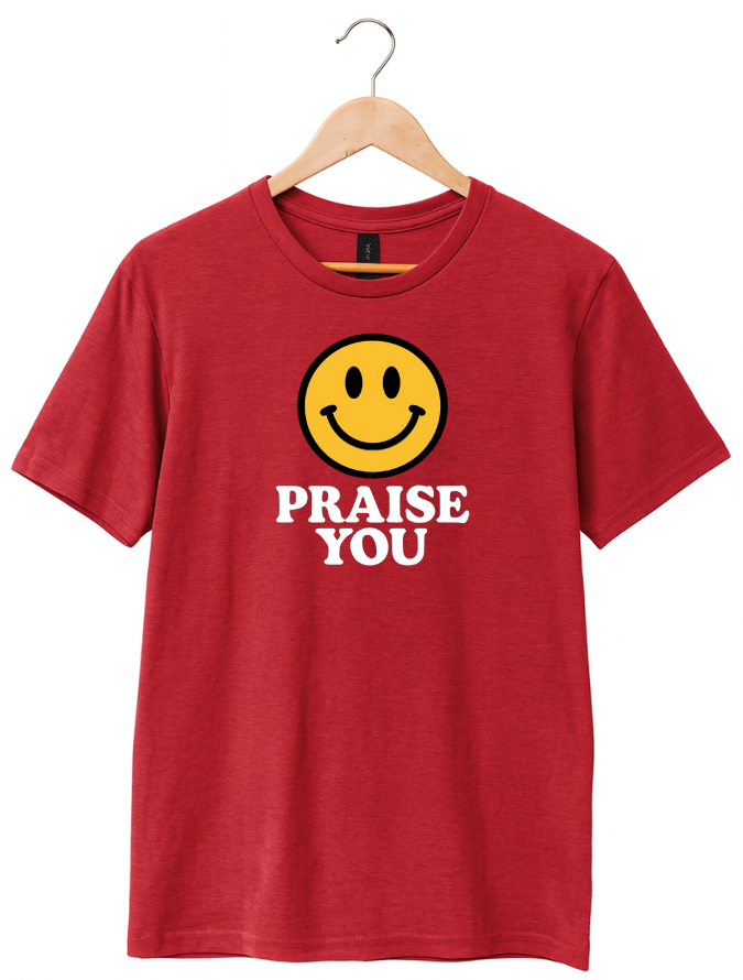 Red t-shirt with a smiley face and 'PRAISE YOU' text on a hanger against a white background