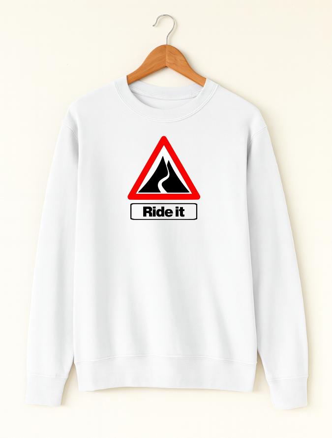 White sweatshirt with a red and black traffic sign graphic and 'Ride it' text on a hanger against a white background