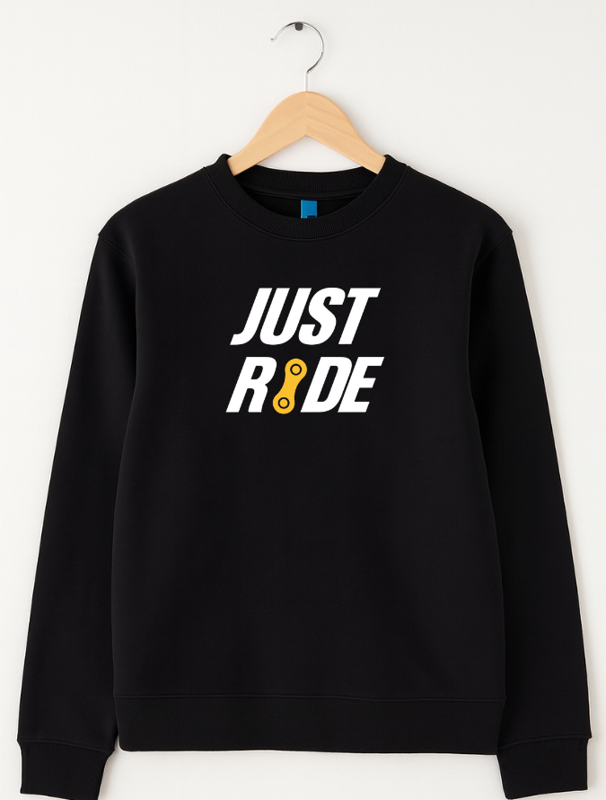 Black sweatshirt with 'JUST RIDE' text on a hanger against a white background