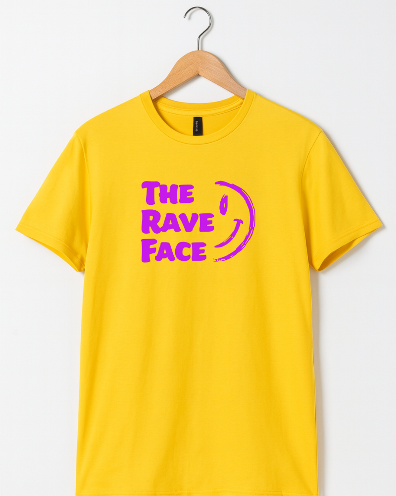 Yellow t-shirt with 'The Rave Face' text on a hanger against a white background